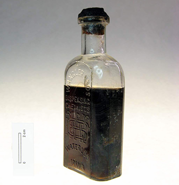 A bottle with Carbolic Acid still inside