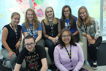 Students working in Coralville are (back row, from left) Marija Pritchard, Brenna Parke, Lindsey Floryance, Meredith Arpy and Elizabeth Pritchard. In front row are Lucas Latimer and Cathy Vanhxay.